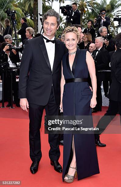 Laurent Solly and Caroline Roux attend the "Slack Bay " premiere during the 69th annual Cannes Film Festival at the Palais des Festivals on May 13,...