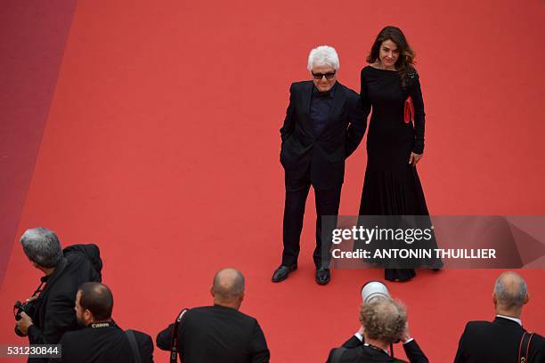 French musician Marc Cerrone and his wife Jill arrive on May 13, 2016 for the screening of the film "Ma Loute " at the 69th Cannes Film Festival in...