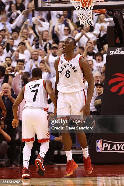 Bismack Biyombo of the Toronto Raptors celebrates a dunk during game five of the NBA Eastern Conference Semi Finals against the Miami Heat at Air...