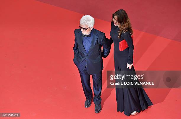 French musician Marc Cerrone and his wife Jill pose on May 13, 2016 as they arrive for the screening of the film "Ma Loute " at the 69th Cannes Film...
