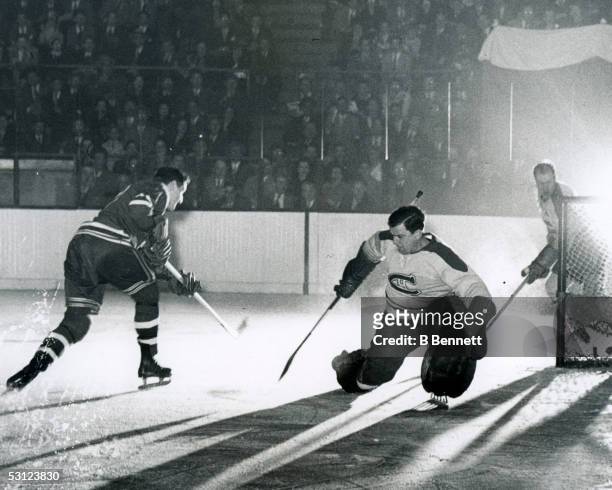 Don Raleigh of the Rangers beats Bill Durnan of the Canadiens, 1-30-49.