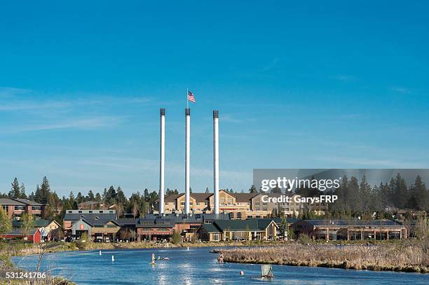 bend oregon old mill district by deschutes river - central oregon stock pictures, royalty-free photos & images