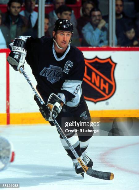Wayne Gretzky of the Los Angeles Kings skates on the ice during an NHL game against the Montreal Canadiens circa 1990's at the Montreal Forum in...