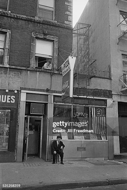 The famous John's Pizzeria of Bleecker Street, located at 278 Bleecker Street, New York City, circa 1976.