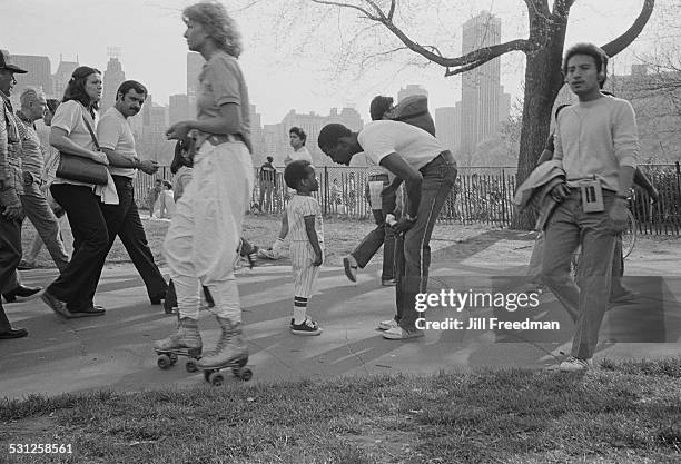 Young people rollerskating in Central Park, New York City, circa 1976.