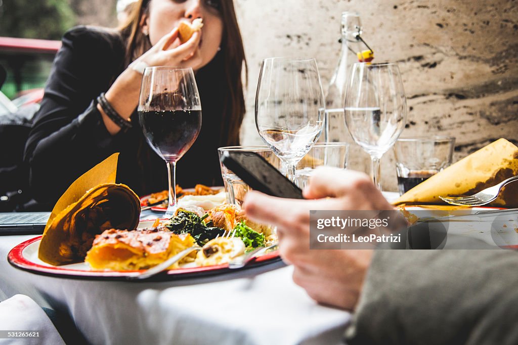 Friends enjoy together a brunch