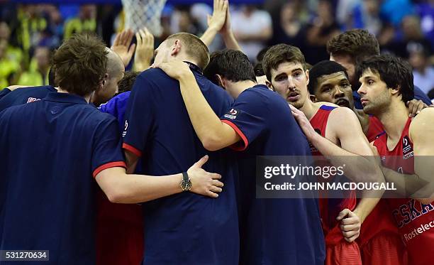 Moscow players, including Nando de Colo come together after defeating Krasnodar during the semi-final basketball match CSKA Moscow vs Lokomotiv Kuban...