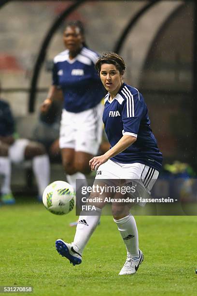 Sarah Ann Walsh of FIFA Legends battles for the ball during an exhibition match between FIFA Legends and MexicanAllstars to celebrate the 50th...