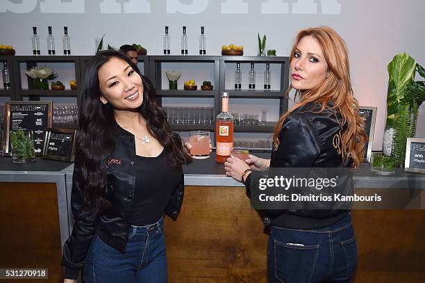 Playmates Hiromi Oshima and Gia Marie attend as Playboy makes its NewFronts debut on May 13, 2016 in New York City.