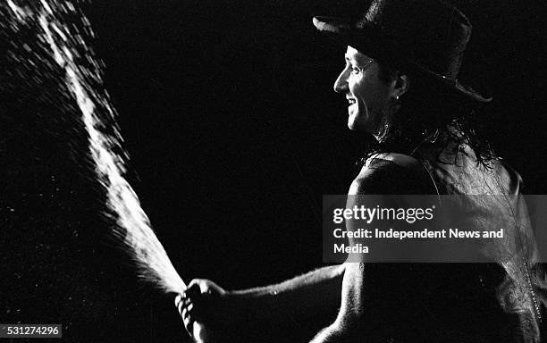 Bono in action at The Point, 26/12/89 for U2's 'Lovetown Tour' of 1989. B.B. King, the legendary blues musician joined them on stage at all but one...