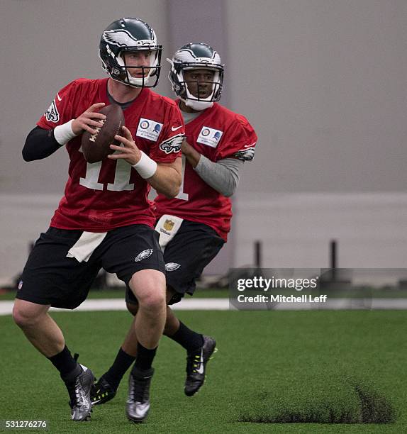 Carson Wentz and Everett Golson of the Philadelphia Eagles participate in rookie camp at the NovaCare Complex on May 13, 2016 in Philadelphia,...