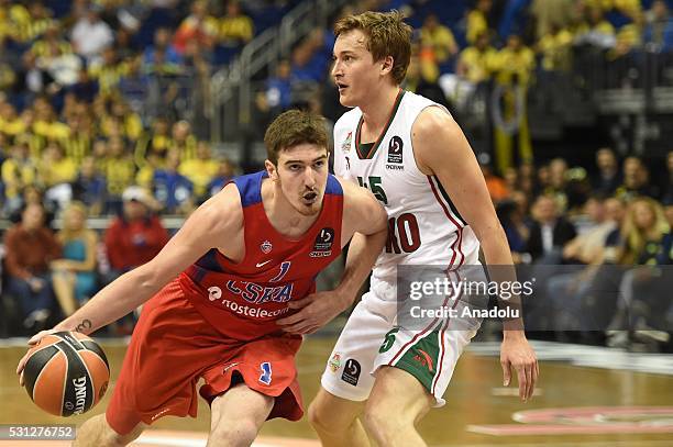 Ryan Broekhoff of Lokomotiv Kuban Krasnodar in action aganist Nando de Colo of Moscow during the Turkish Airlines Euroleague Semi Final game between...