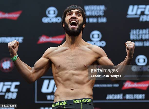 Zubaira Tukhugov of Russia steps on the scale during the UFC 198 weigh-in at Arena da Baixada stadium on May 13, 2016 in Curitiba, Parana, Brazil.