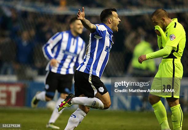 Ross Wallace of Sheffield Wednesday celebrates scoring a goal to make the score 1-0 during the Sky Bet Championship Play Off First Leg match between...