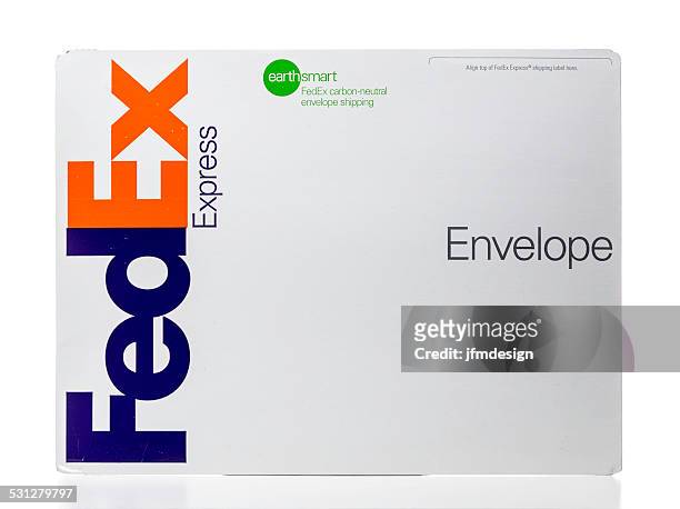 federal express earthsmart envelope - federal express stock pictures, royalty-free photos & images