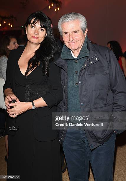 Claude Lelouch and Valerie Perrin attend The Hollywood Foreign Press Association Honour Filmaid International party during The 69th Annual Cannes...