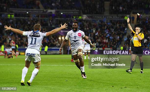 Marvin O'Connor and Fulgence Ouedraogo of Montpellier celebrate their team;s 26-19 victory as the final whistle blows during the European Rugby...