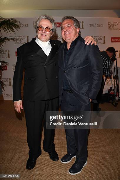 George Miller and Jim Gianopulos attend The Hollywood Foreign Press Association Honour Filmaid International party during The 69th Annual Cannes Film...