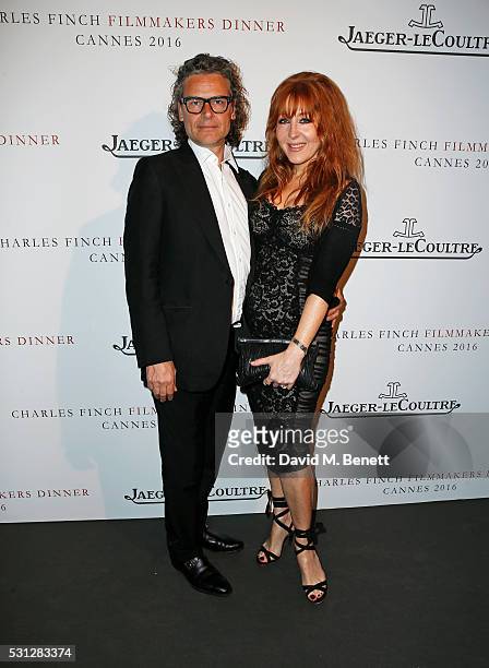 George Waud and Charlotte Tilbury attend The 8th Annual Filmmakers Dinner hosted by Charles Finch and Jaeger-LeCoultre at Hotel du Cap-Eden Roc on...