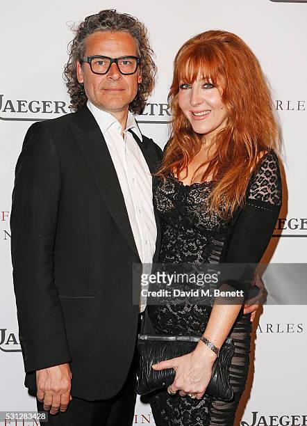 George Waud and Charlotte Tilbury attend The 8th Annual Filmmakers Dinner hosted by Charles Finch and Jaeger-LeCoultre at Hotel du Cap-Eden Roc on...