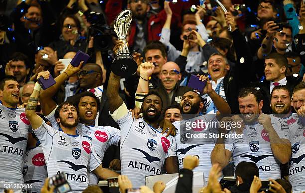 Captain Fulgence Ouedraogo of Montpellier lifts the trophy following his team's 26-19 victory during the European Rugby Challenge Cup Final match...
