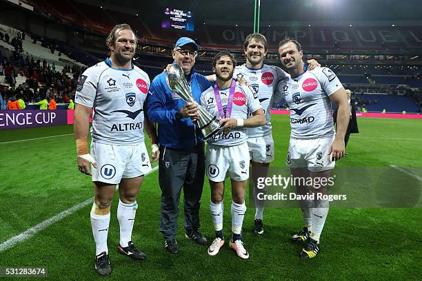 Jannie Du Plessis, Jake White, Benoit Paillaugue of Montpellie and Francois Steyn and Bismarck Du Plessis of Montpellier celebrate with the trophy...