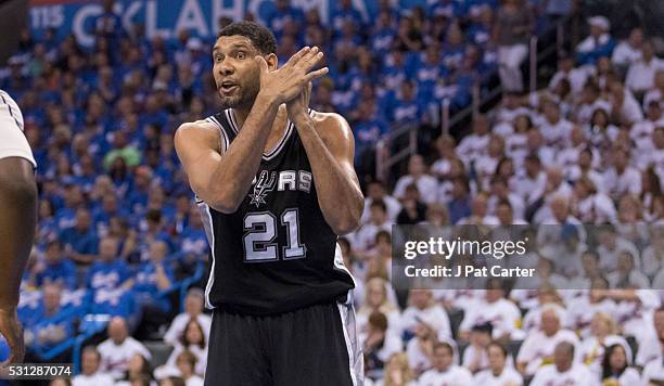 Tim Duncan of the San Antonio Spurs gestures for a play against the Oklahoma City Thunder during Game Three of the Western Conference Semifinals...