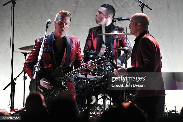 Josh Homme and Matt Helders perform live on stage with Iggy Pop during the Post Pop Depression tour at the Royal Albert Hall on May 13, 2016 in...