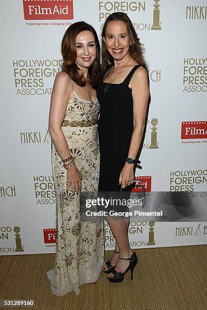 Elsa Zylbertsein and Caroline Barron attend The Hollywood Foreign Press Association Honour Filmaid International party during The 69th Annual Cannes...