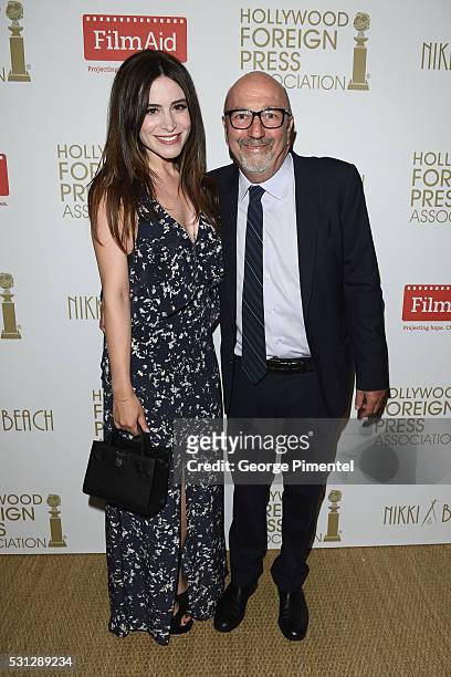 Belcim Bilgin and Lorenzo Soria attend The Hollywood Foreign Press Association Honour Filmaid International party during The 69th Annual Cannes Film...