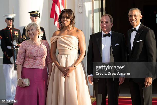 To R, Ulla Lofven, First Lady Michelle Obama, Prime Minister of Sweden Stefan Lofven and U.S. President Barack Obama pose for a photo during arrivals...