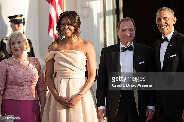 To R, Ulla Lofven, First Lady Michelle Obama, Prime Minister of Sweden Stefan Lofven and U.S. President Barack Obama pose for a photo during arrivals...