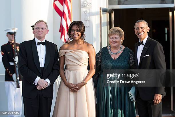 To R, Sindre Finnes, First Lady Michelle Obama, Prime Minister of Norway Erna Solberg, and U.S. President Barack Obama pose for a group photo during...