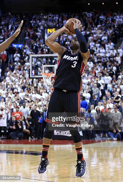 Dwyane Wade of the Miami Heat shoots the ball in the second half of Game Five of the Eastern Conference Semifinals against the Toronto Raptors during...