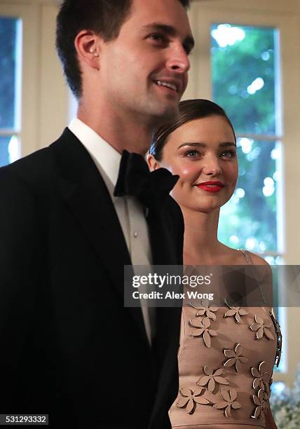 Snapchat CEO Evan Spiegel and his model girlfriend Miranda Kerr arrive at a Nordic State Dinner May 13, 2016 at the White House in Washington, DC....
