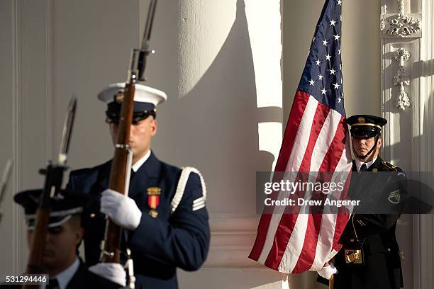 Members of the Honor exit after the arrival of leaders for the Nordic state dinner at the North Portico at the White House, May 13 in Washington, DC....