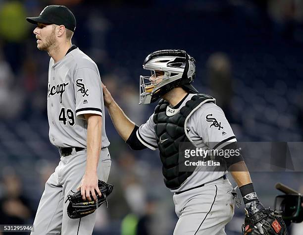 Chris Sale of the Chicago White Sox is congratulated by teammate Alex Avila after the win against the New York Yankees at Yankee Stadium on May 13,...