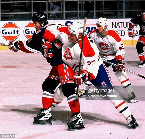 Dave manson Mugs Ranger center Wayne Gretzky.