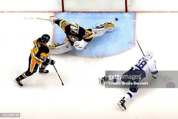 Ondrej Palat of the Tampa Bay Lightning scores a goal against Matt Murray of the Pittsburgh Penguins during the second period in Game One of the...