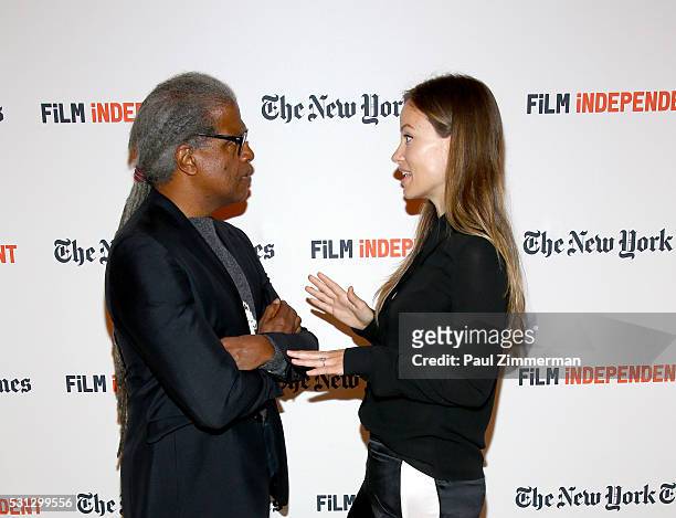 Film Independent curator Elvis Mitchell and actress Olivia WIlde pose at the Film Independent Presents Live Read Of "Hannah And Her Sisters" at Times...