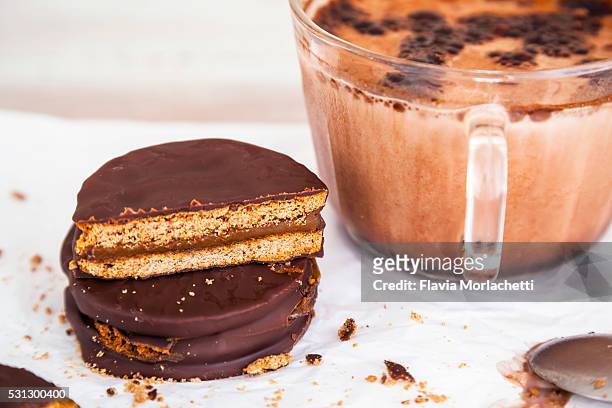 alfajor and iced chocolate milk - alfajor stock pictures, royalty-free photos & images