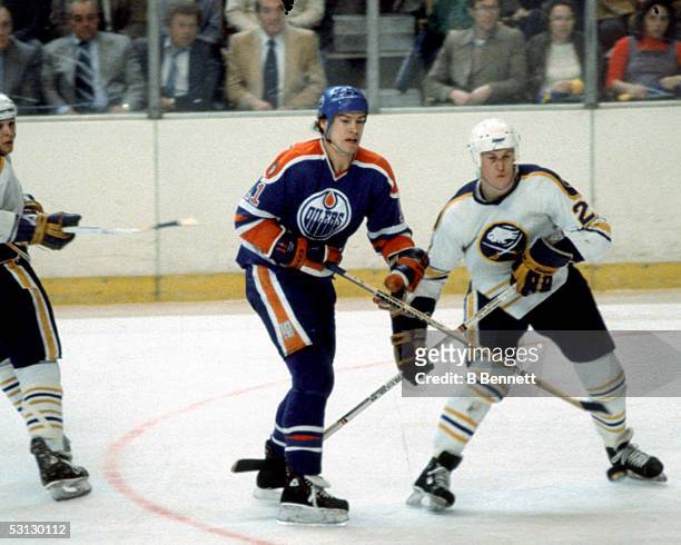 Mark Messier battles with the Buffalo Sabres.
