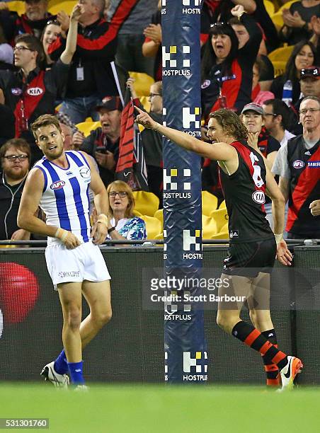 Joe Daniher of the Bombers celebrates after kicking a goal during the round eight AFL match between the Essendon Bombers and the North Melbourne...