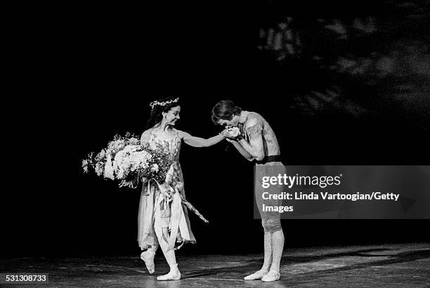 Russian-born ballet dancer Rudolf Nureyev kisses the hand of English prima ballerina assoluta Dame Margot Fonteyn after their performance in...