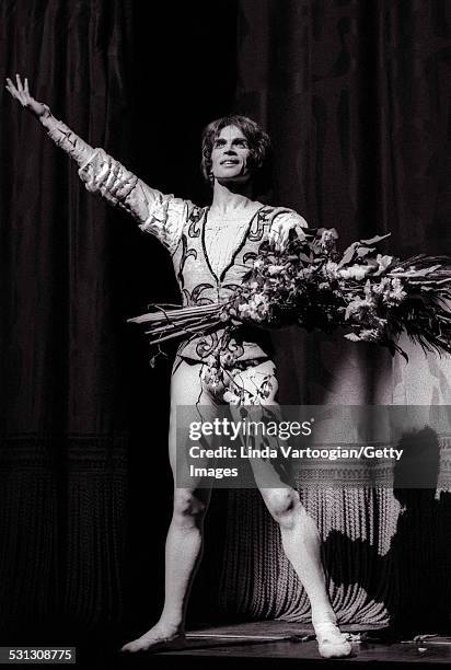 Russian-born ballet dancer Rudolf Nureyev takes a bow after his performance in the Royal Ballet/Sir Kenneth MacMillan's production of 'Romeo and...