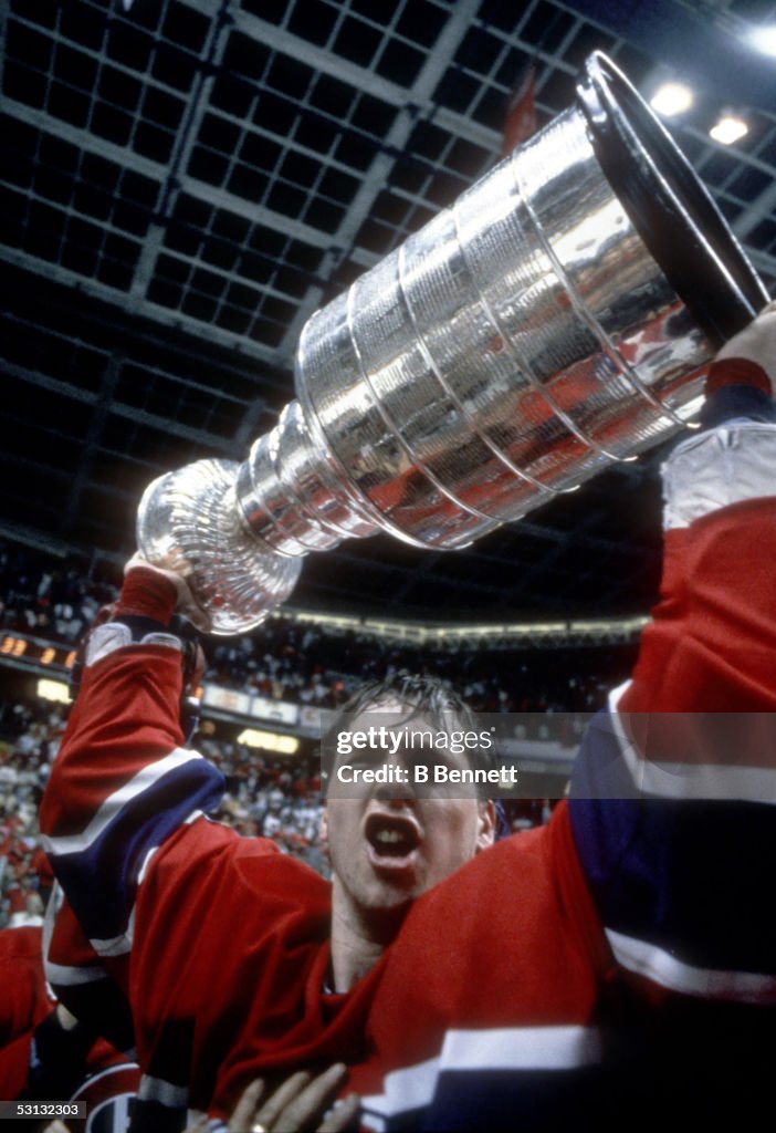 Roy raises cup, 1986 Stanley Cup...