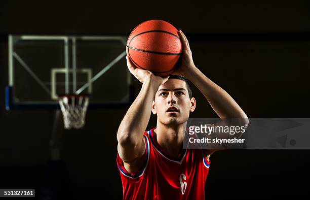 basketball player. - taking a shot sport stock pictures, royalty-free photos & images
