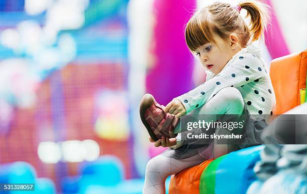 i'm a big girl! - kid in big shoes stock pictures, royalty-free photos & images