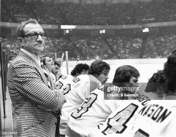 Head Coach Fred Shero of the Philadelphia Flyers focuses on play during a circa 1970s NHL game. Shero coached the Flyers from 1971-78, taking the...