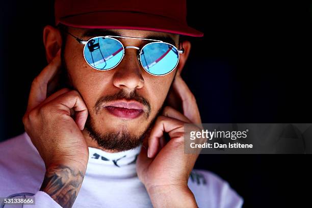 Lewis Hamilton of Great Britain and Mercedes GP in the garage during final practice ahead of the Spanish Formula One Grand Prix at Circuit de...